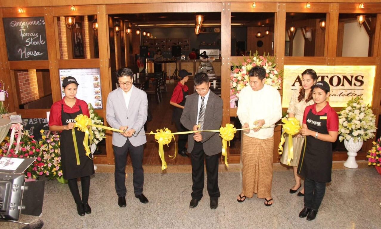 Photo of business partners in opening ASTONS specialities franchise in Myanmar.