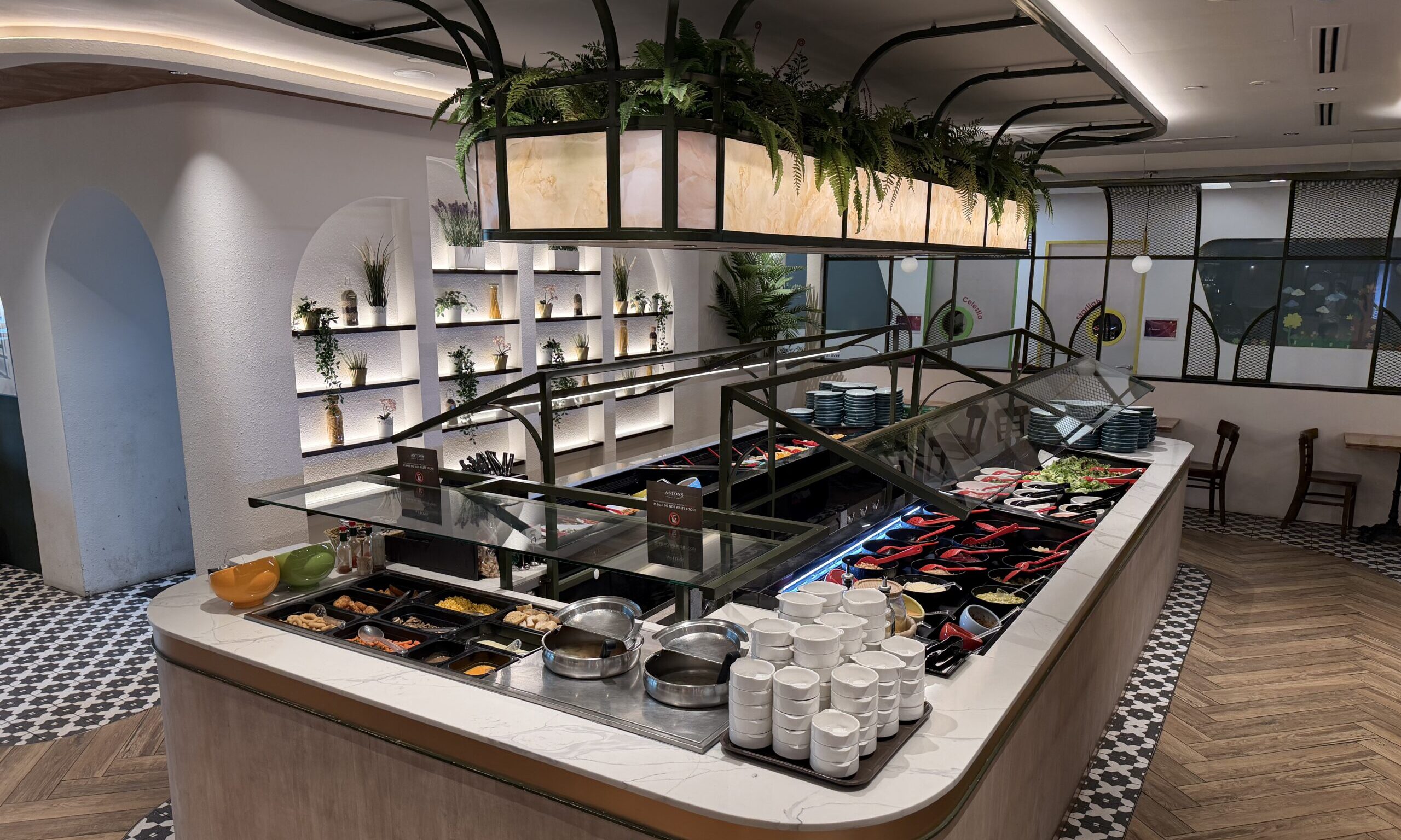 Extensive hot and cold dish salad bar at ASTONS Steak & Salad located at Marina Square.